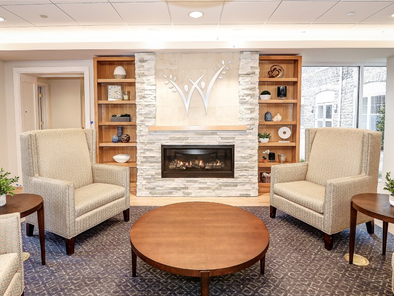 Wesley Enhance Living Upper Moreland, Copy Of Lobby_1_seating_sitting_fireplace_upper_moreland_wesley_enhanced_living_senior_assisted_living_communities.jpg